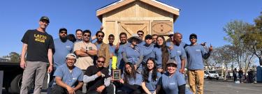 LATTC Carpentry students pose in front of a chicken coop