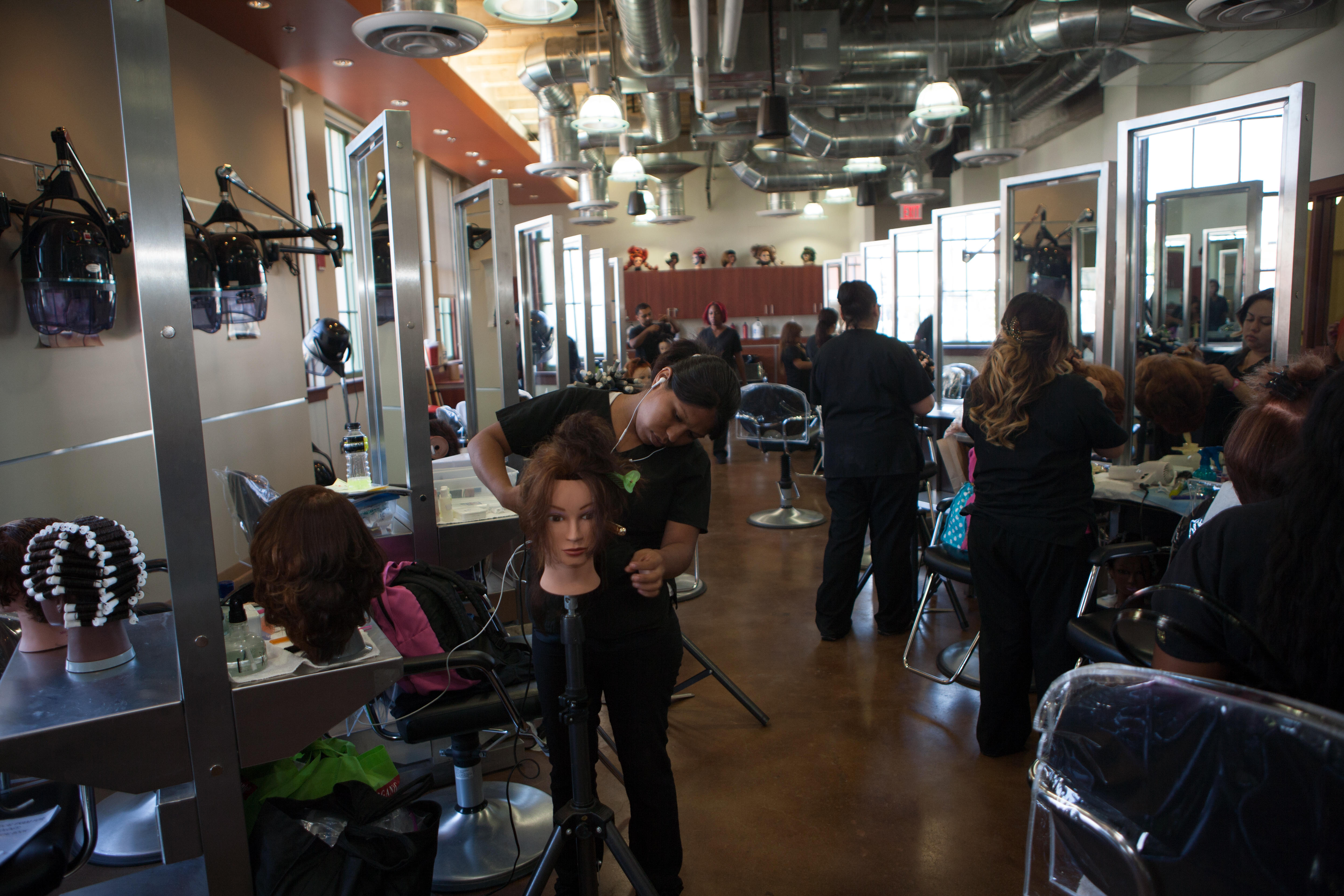 Cosmetology Students Working in Class