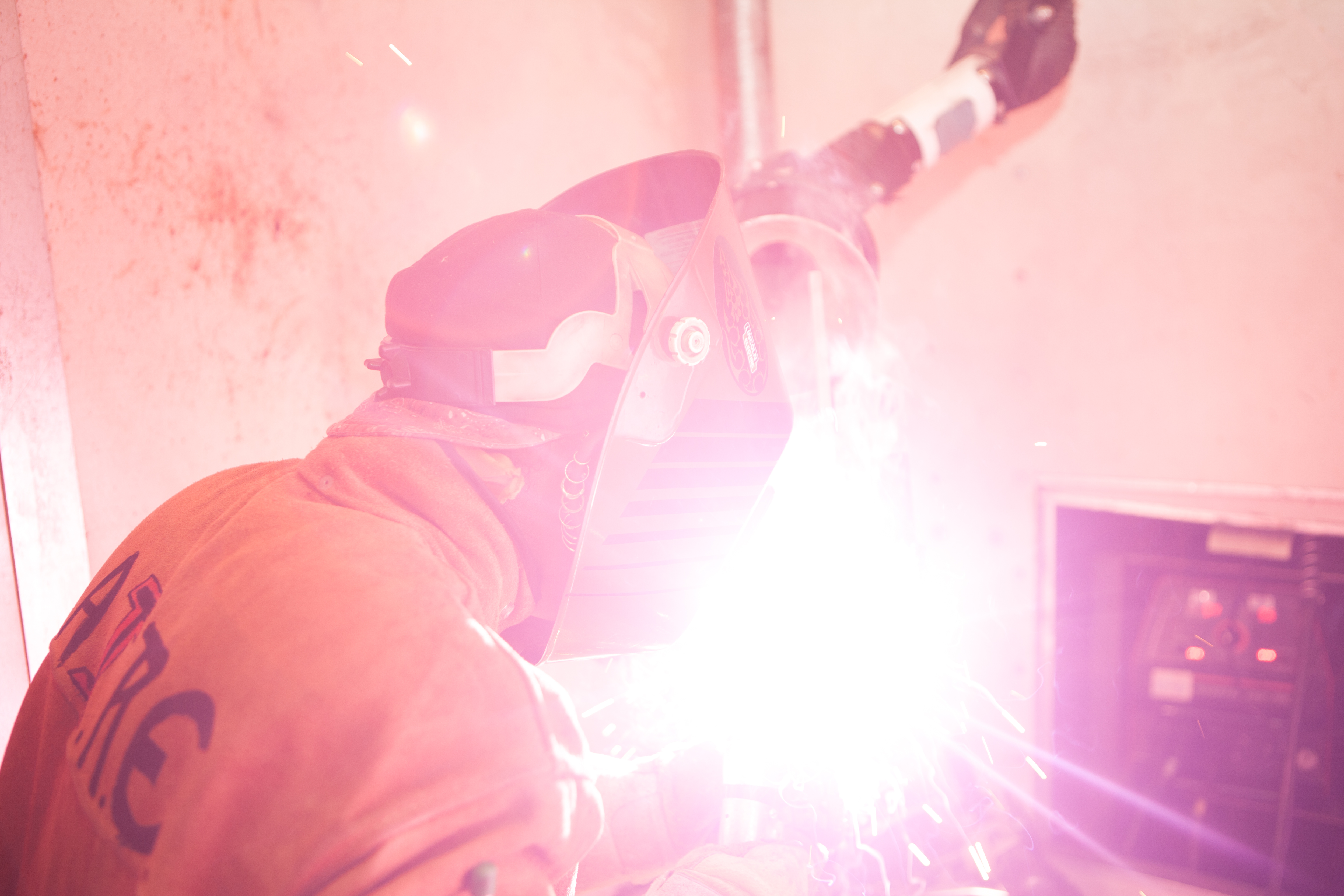 Man Welding with a Safety Mask