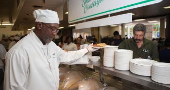 Culinary Student Serving Plate