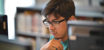 Young Student Looking Computer