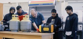 Students with refrigeration instructor