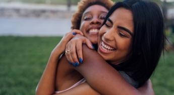 Two women hugging