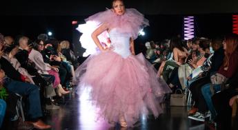 Gold Thimble Fashion Show model on runway