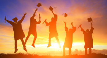 Graduates jumping