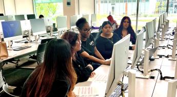 Students getting assistance from counselor