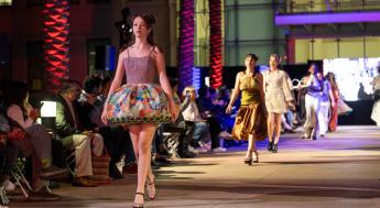 Fashion models walking down runway