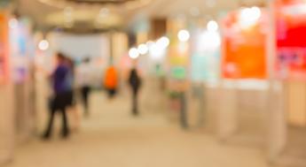 People walking in exhibition hall