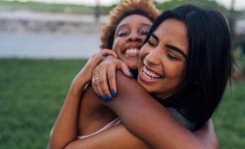 Two women hugging