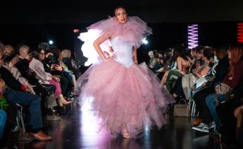 Gold Thimble Fashion Show model on runway