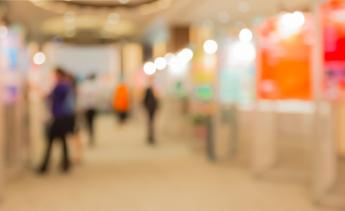 People walking in exhibition hall