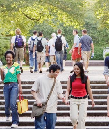 Students Walking on the Stairs of College