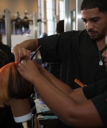 Students Doing a Haircut