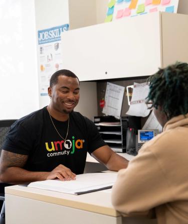 Umoja Counselor and student