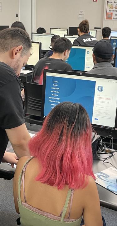 Students receiving assistance from counselor