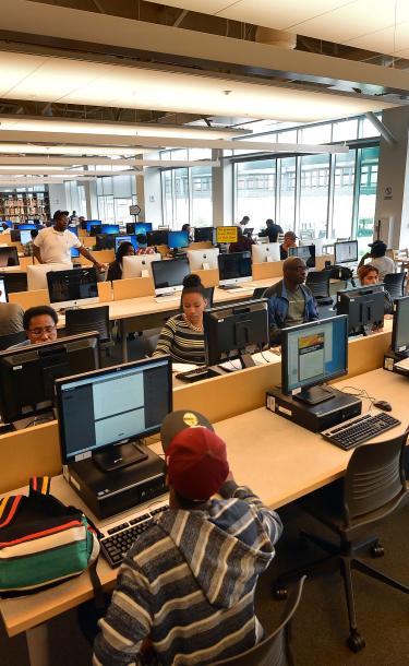 Students Using the Equipment of the Computer Lab 