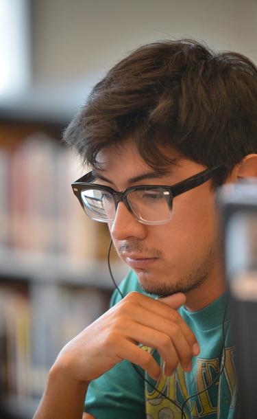 Young Student Looking Computer