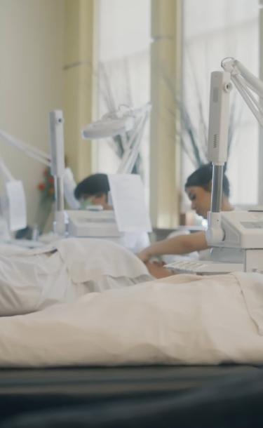 Skin therapy technicians working on clients