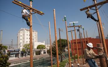 Electrical Line Workers Doing Electrical Connections