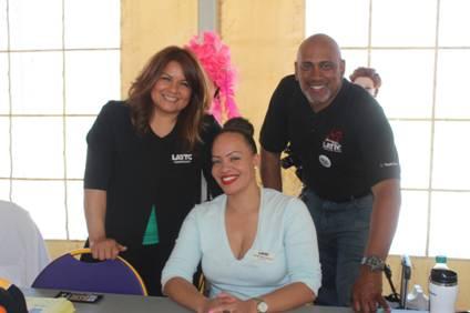 Three Staff Members Smiling