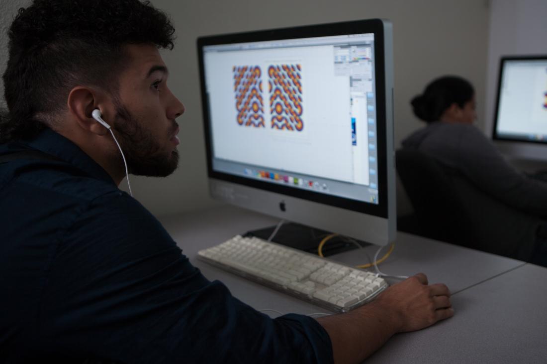 Digital Media Student Working on His Computer