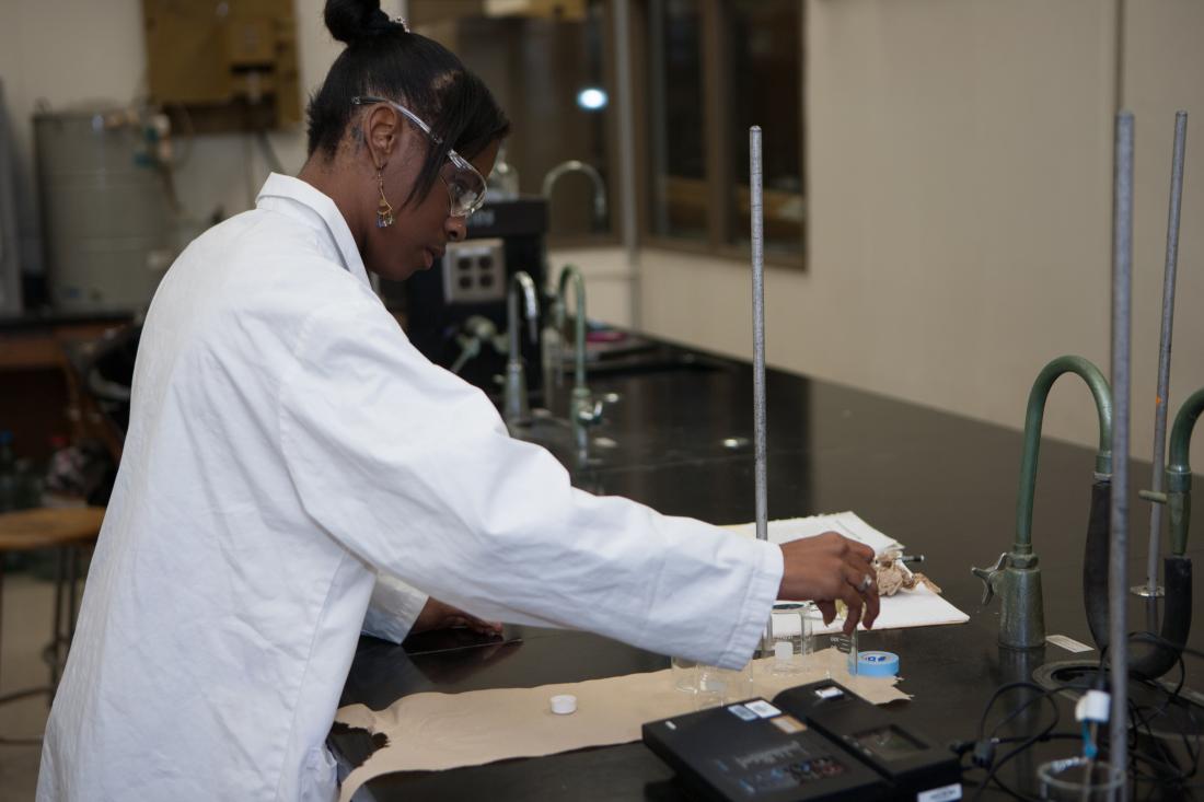 Girl Student Using Scientific Equipment 