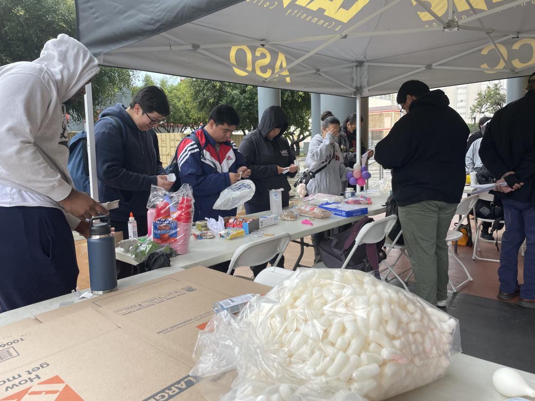 Students building egg drop capsules