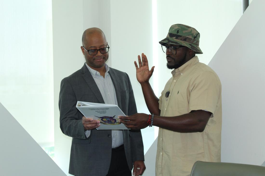 Incoming ASO President being sworn in by Dr. Alfred McQuarters
