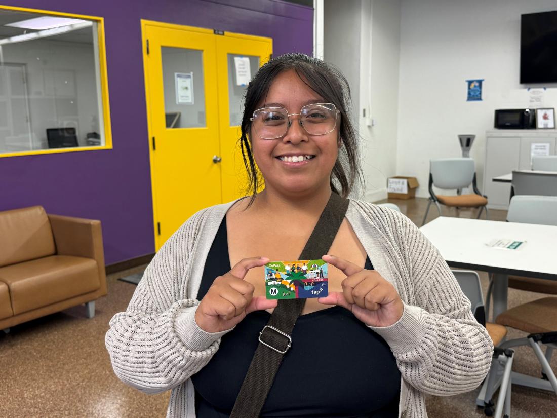 Student holding Metro GoPass