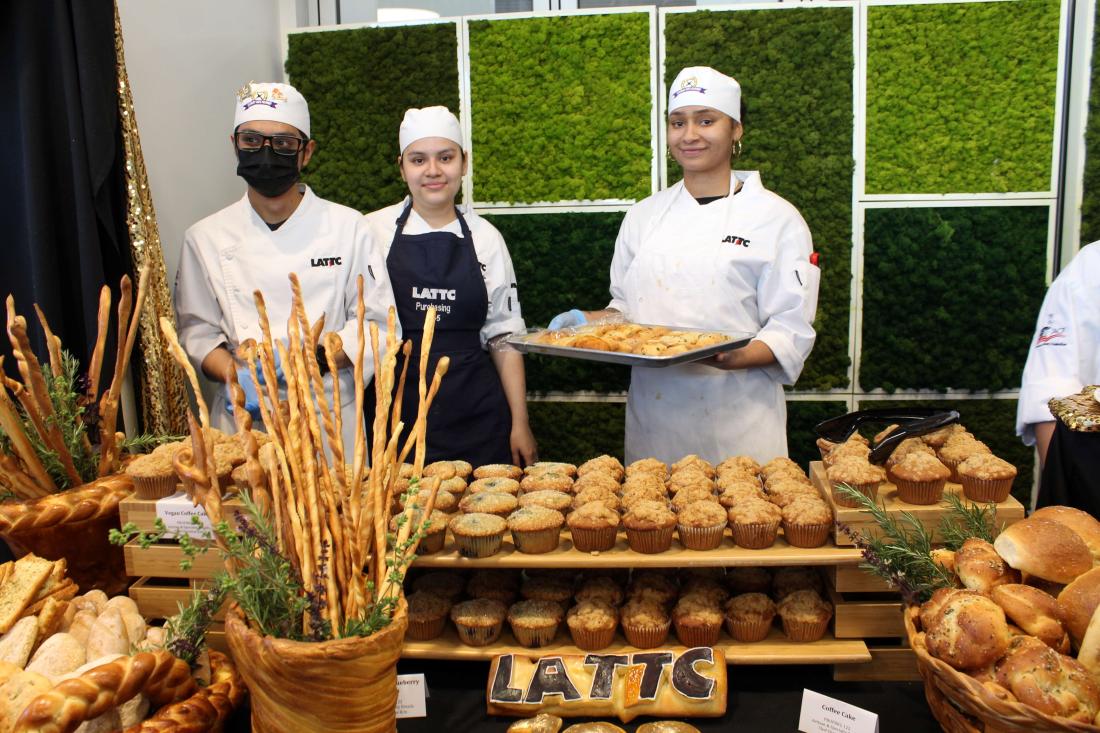 Culinary Arts students in front of Pastries and desserts 