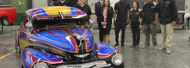 LATTC administrators and students with Chevy Fleetline Lowrider